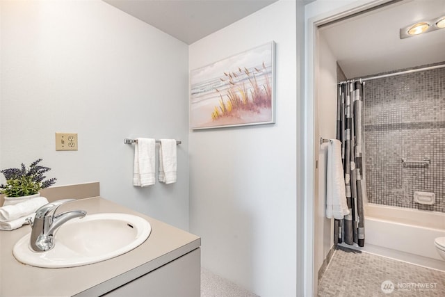 bathroom featuring shower / tub combo with curtain and vanity