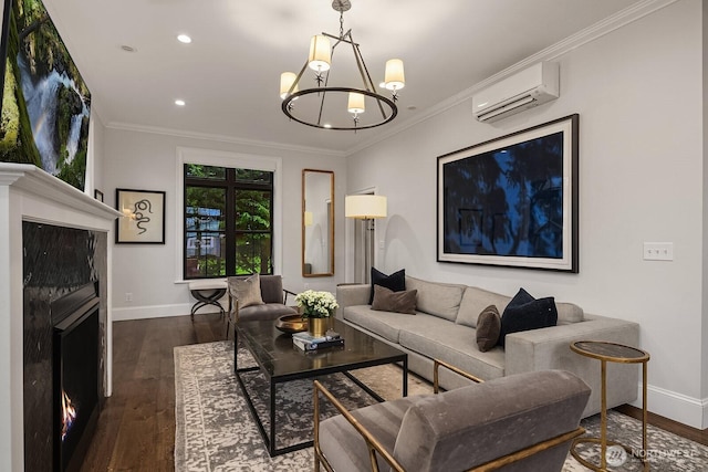 living area featuring a warm lit fireplace, a wall unit AC, dark wood-style flooring, baseboards, and ornamental molding