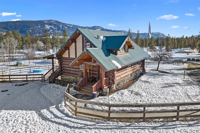 exterior space featuring a mountain view