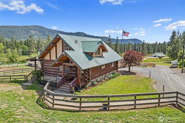 1427 N Chapin Rd, Evans, WA 99126 - rear view of property featuring log exterior, a mountain view, and metal roof