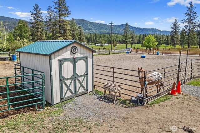 1427 N Chapin Rd, Evans, WA 99126 - view of shed featuring a mountain view and a view of rural / pastoral area