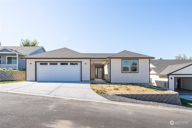 single story home featuring a garage