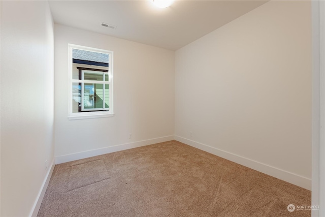 view of carpeted spare room