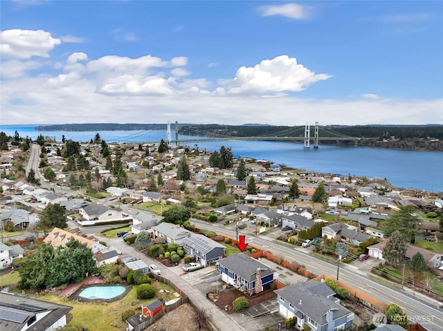 drone / aerial view featuring a water view