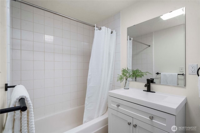 full bathroom featuring shower / bath combo and vanity