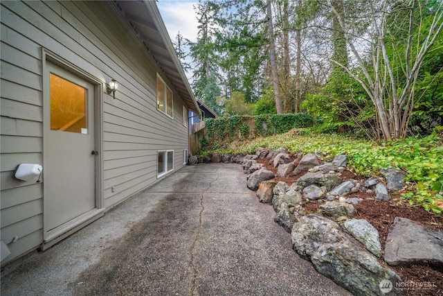 view of yard featuring a patio area and fence