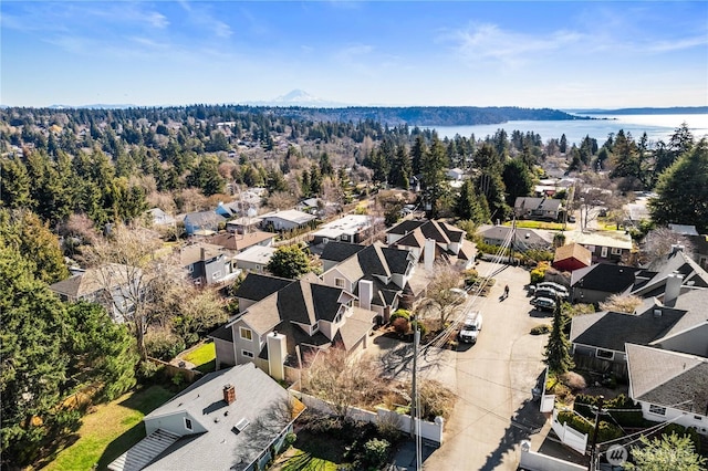 aerial view featuring a residential view and a water view