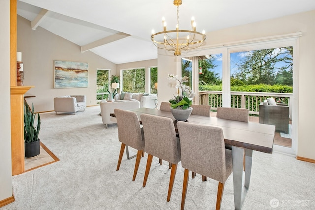 dining space with a chandelier, baseboards, lofted ceiling with beams, and carpet