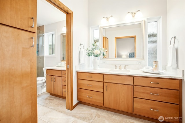 full bath featuring tile patterned flooring, toilet, and vanity