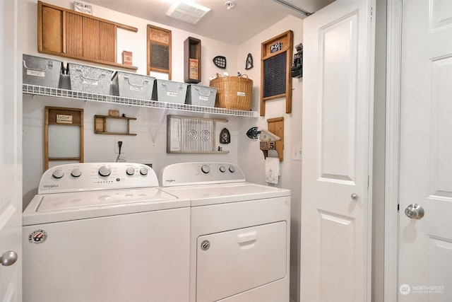 washroom featuring independent washer and dryer