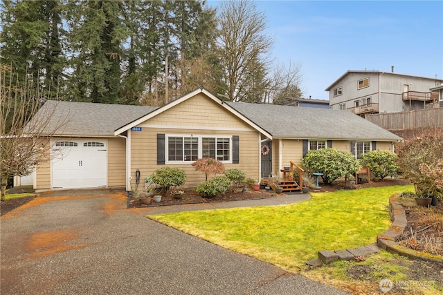 single story home with aphalt driveway, a front lawn, an attached garage, and a shingled roof