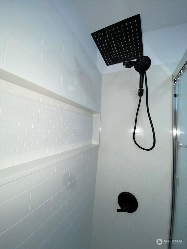 room details with a tile shower