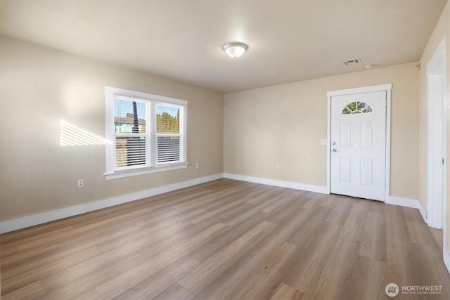 foyer with light hardwood / wood-style flooring