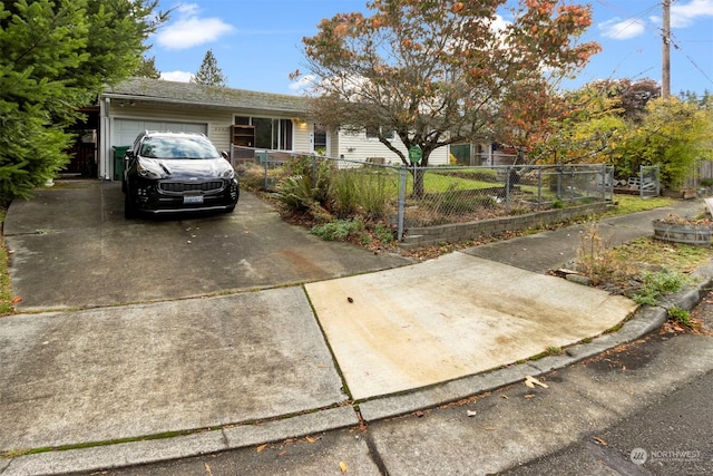 single story home with a garage