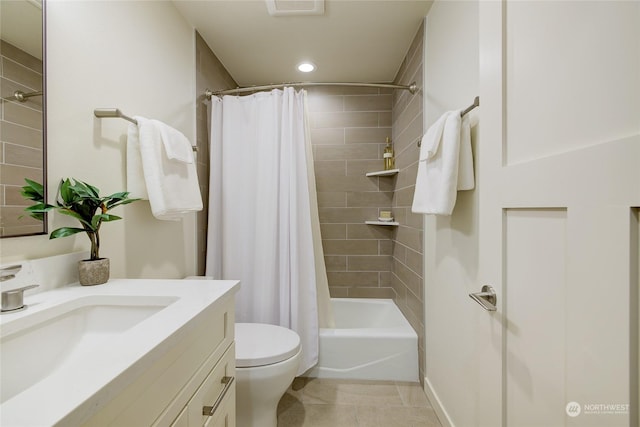 full bathroom featuring shower / bath combination with curtain, vanity, toilet, and tile patterned flooring