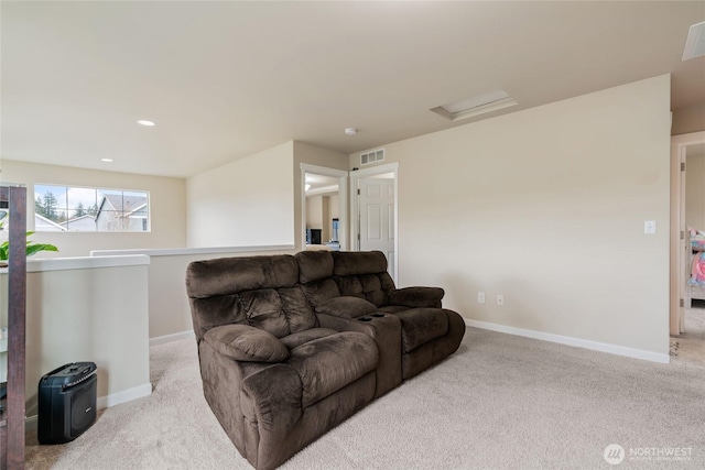 carpeted living area featuring recessed lighting, visible vents, and baseboards