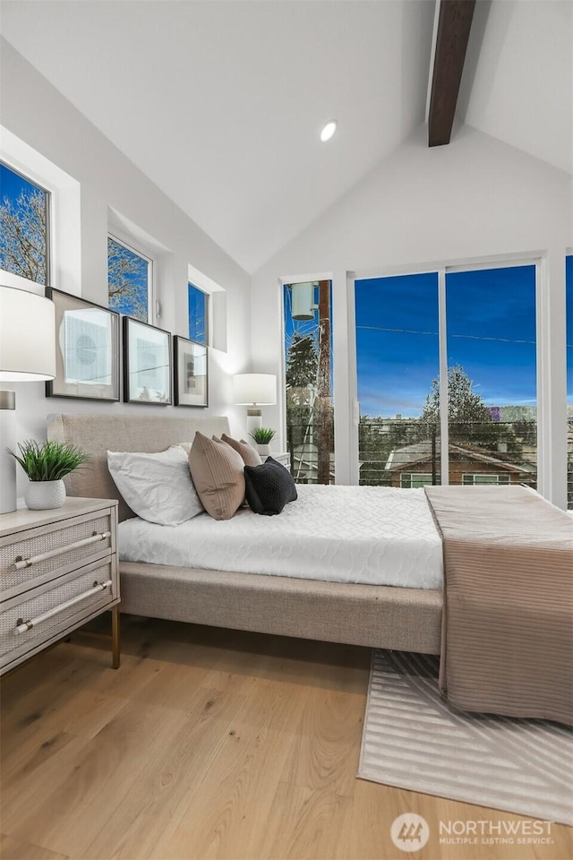 bedroom featuring lofted ceiling with beams, light wood finished floors, and recessed lighting