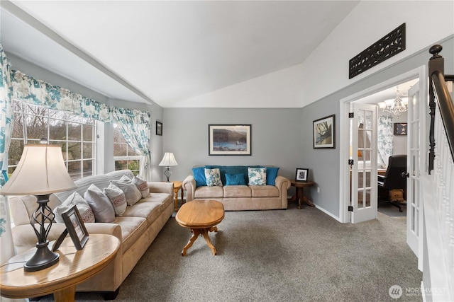 carpeted living room featuring lofted ceiling, baseboards, a notable chandelier, and french doors