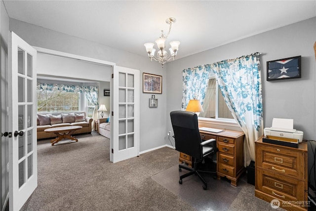 office featuring a chandelier, dark carpet, and french doors