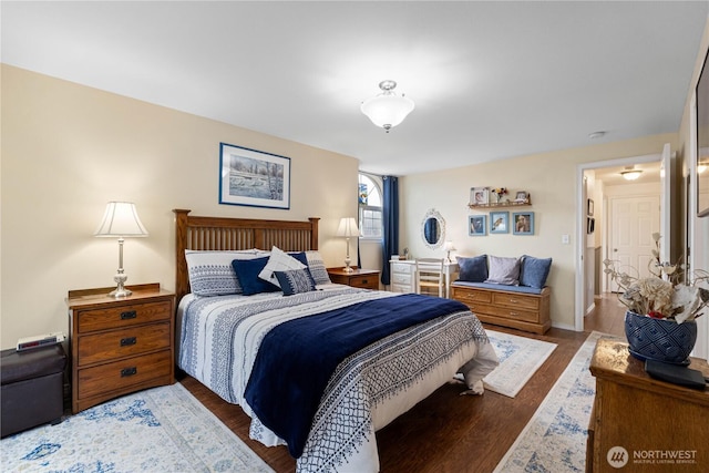 bedroom featuring wood finished floors