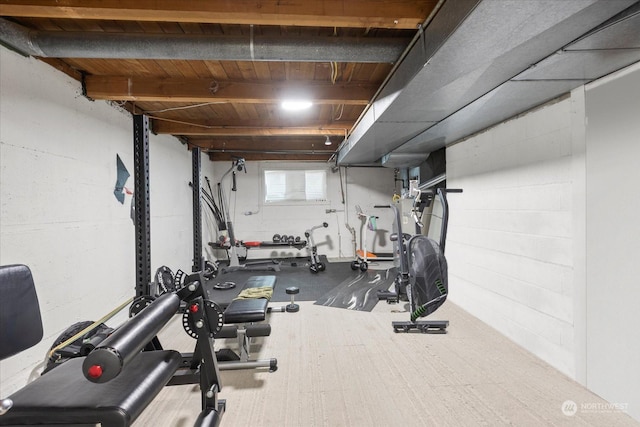 exercise area featuring wooden ceiling