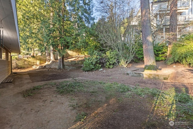 view of yard with fence