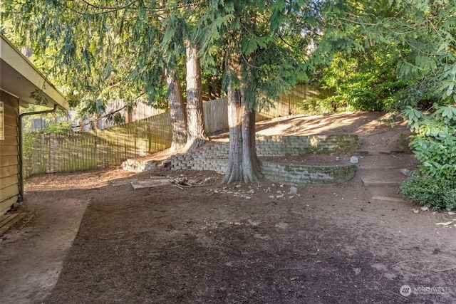 view of yard featuring fence