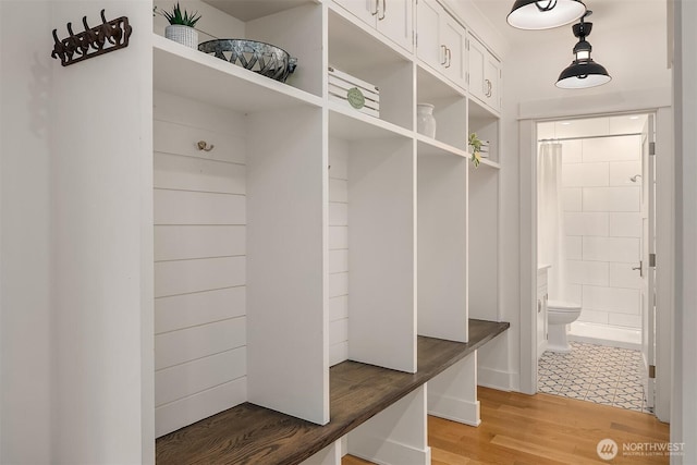 mudroom featuring wood-type flooring