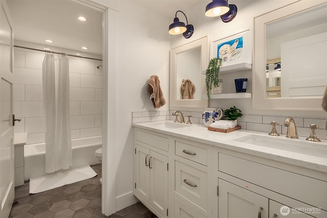 full bathroom featuring toilet, shower / bath combo, tile patterned flooring, and vanity