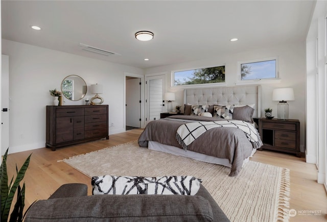 bedroom featuring light wood-type flooring