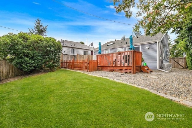 view of yard with a wooden deck