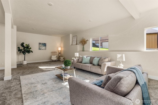 living room featuring light carpet and beam ceiling