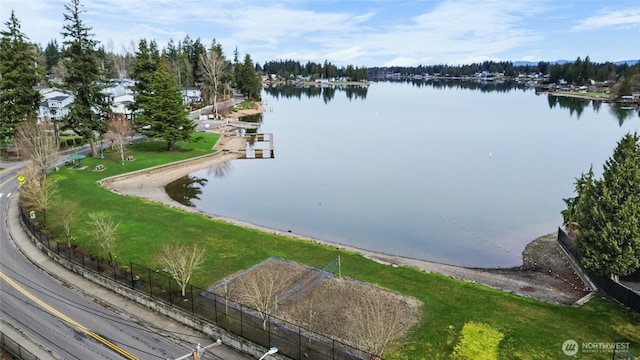 drone / aerial view with a water view