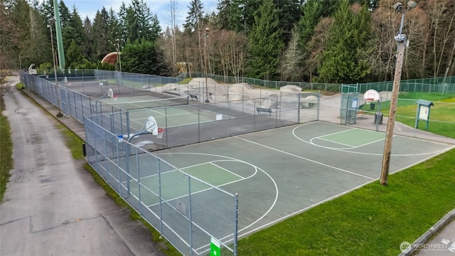 view of sport court with community basketball court and fence