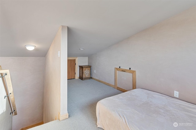 bedroom with light colored carpet