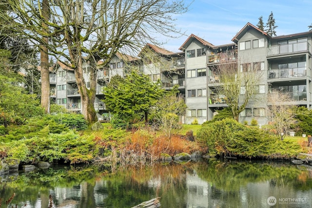 view of building exterior featuring a water view