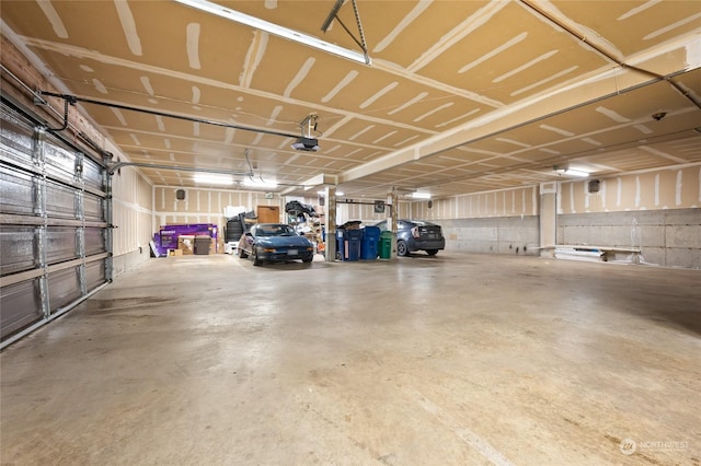 garage featuring a garage door opener