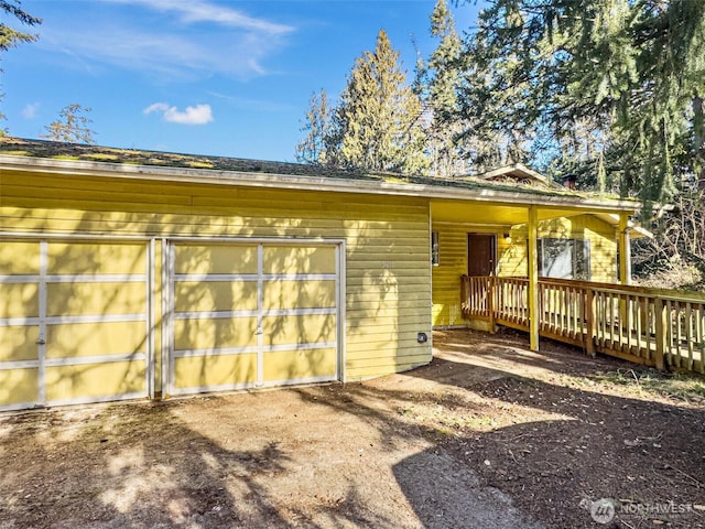 exterior space featuring a garage