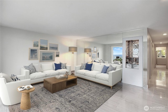 living room featuring a wealth of natural light