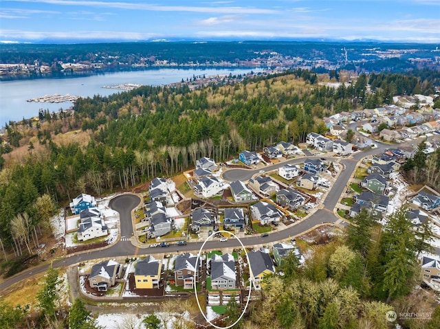 drone / aerial view with a water view