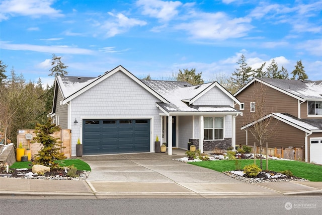 craftsman inspired home with a garage