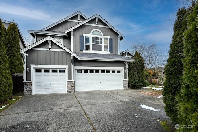 craftsman-style house featuring a garage