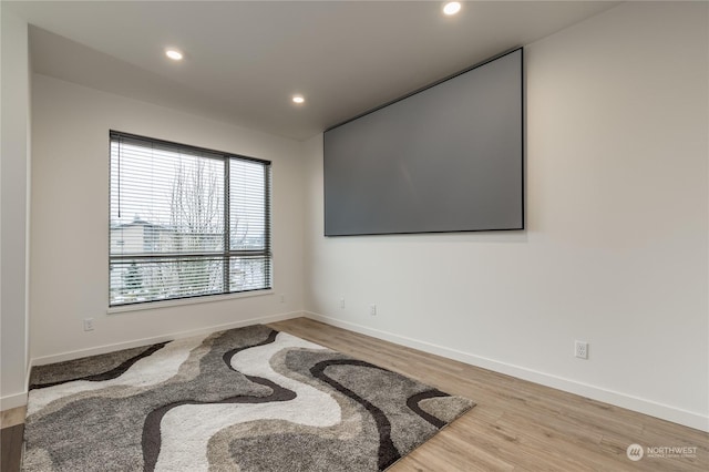 empty room with hardwood / wood-style floors