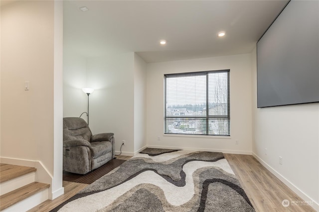 living area featuring hardwood / wood-style flooring