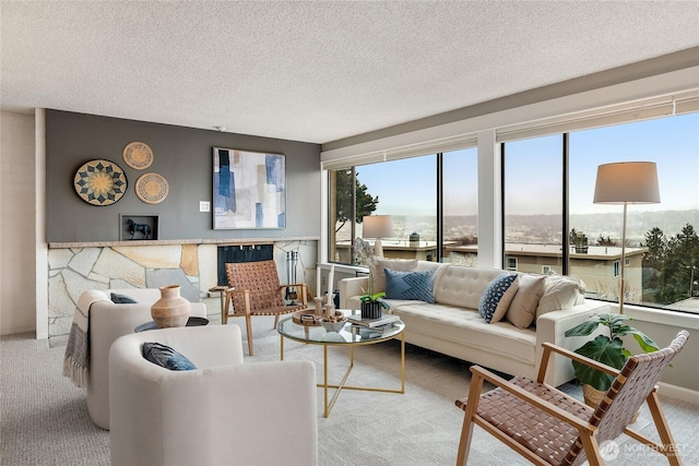 carpeted living room featuring a textured ceiling