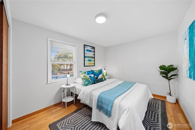 bedroom featuring hardwood / wood-style floors