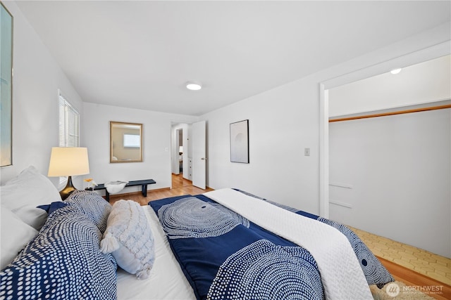 bedroom featuring light wood-type flooring