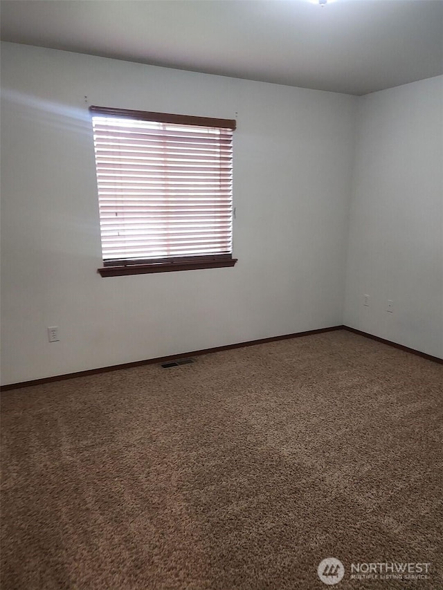 view of carpeted empty room