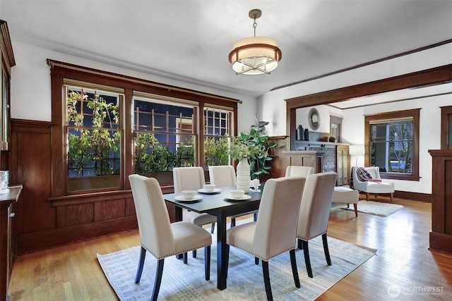 dining area with light wood-style floors