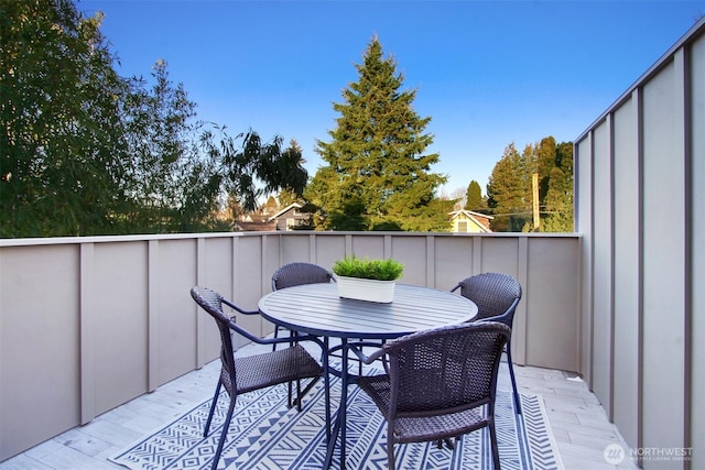 balcony featuring outdoor dining space